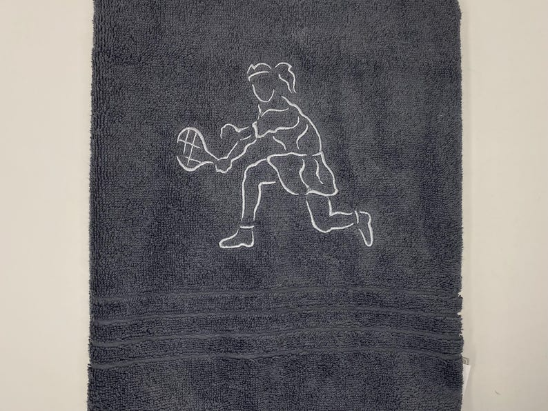Graues Handtuch mit Tennisfigur